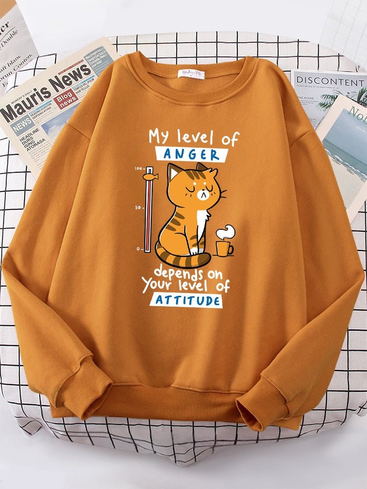a brown cat pattern sweater with angry cat picture
