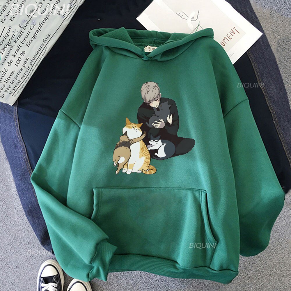 green color cat hoodie in japanese style with a picture of cats cuddling and playing with their owner which looks adorable