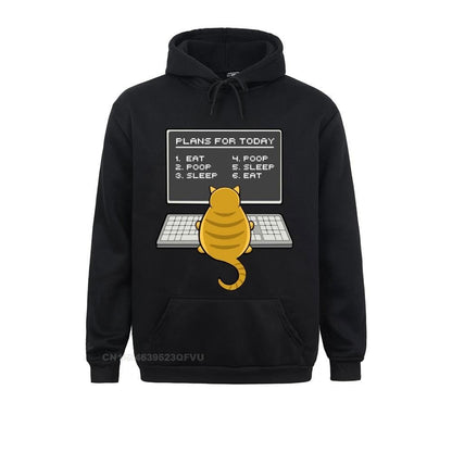 black hoodie that looks funny featuring an orange cat in front of computer planning his day which revolves around sleeping and eating