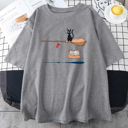 gray color cat shirt printed with a small black cat sitting on a broom