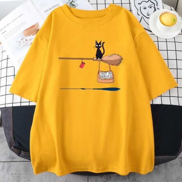 a vibrant color yellow cat shirt featuring a black cat riding a bloom with a bag quoted with not in service