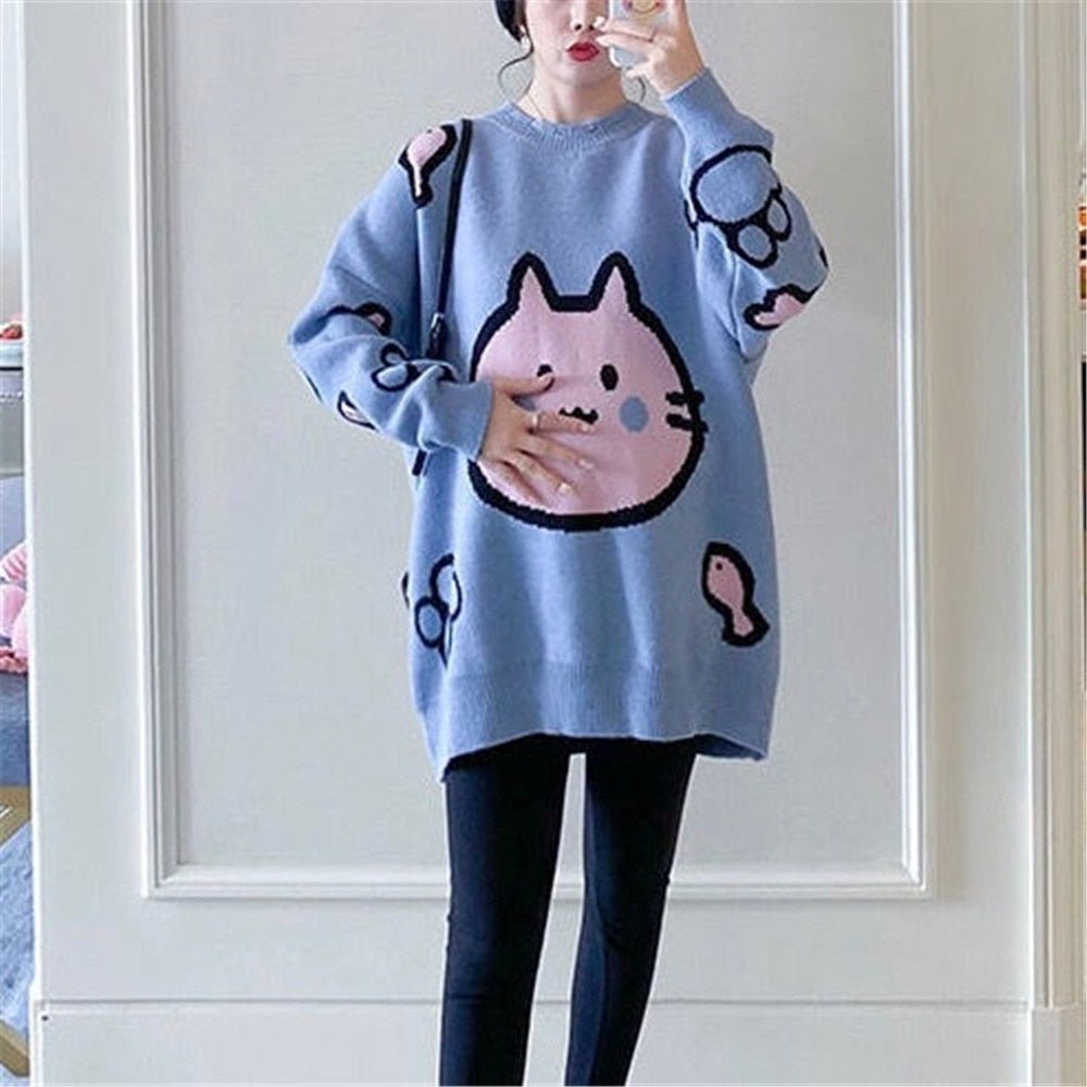 a woman wearing a blue color cute cat sweater for woman