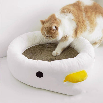 cat bed that comes with scratcher that looks adorable 