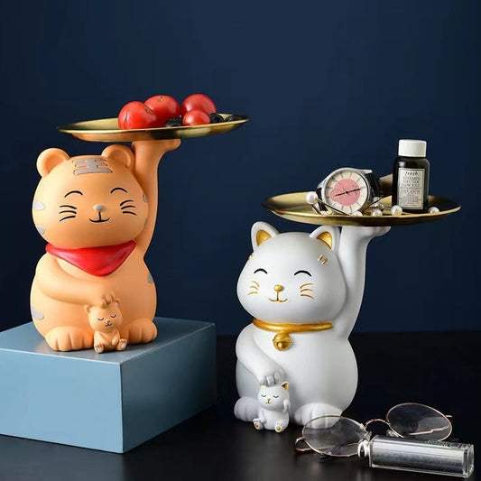 a set of cat figurine holding a tray for putting personal items