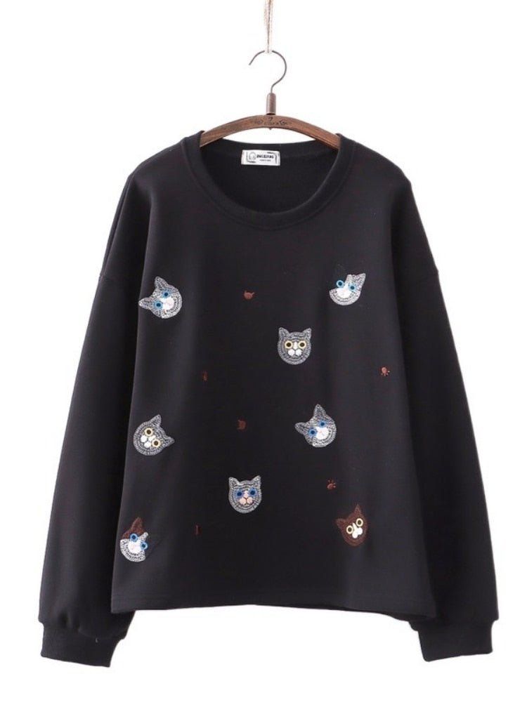 a black color embroidered cat sweater with cute cats design