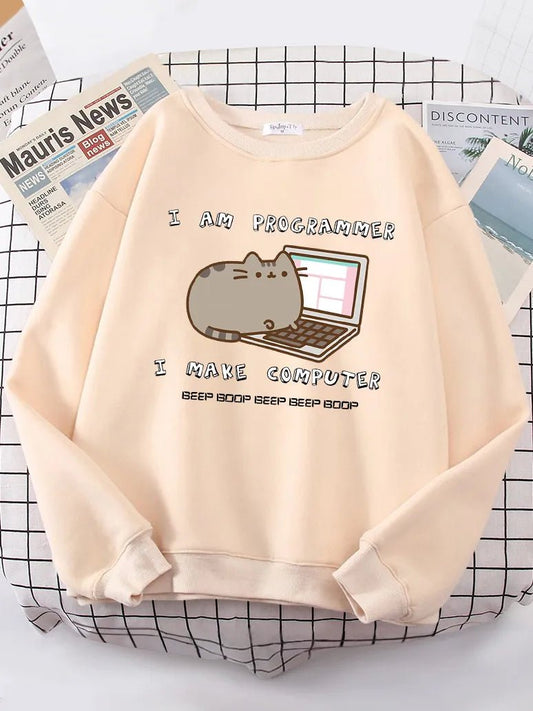 Sweater with a programmer cat graphic in front of a computer