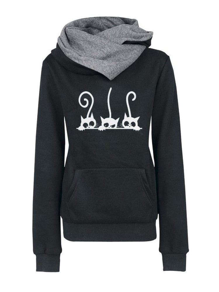 black hoodie with a picture of 3 white witch cats peeking
