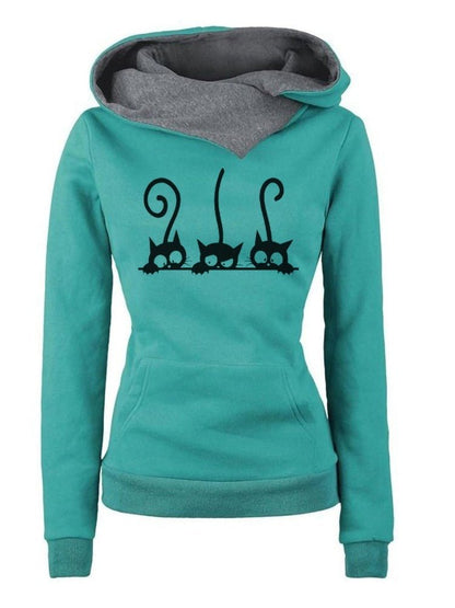 green color cat hoodie featuring three cheeky black cats peeking down the pullover