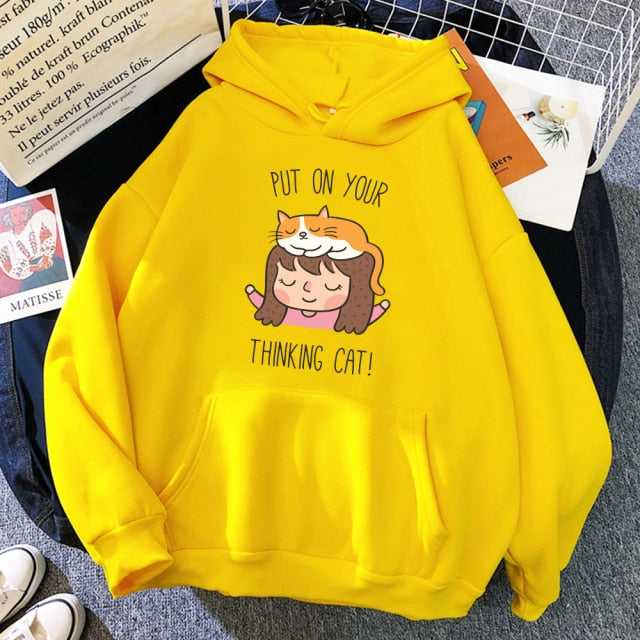 yellow color hoodie made from cotton with a picture of a little girl and a cat