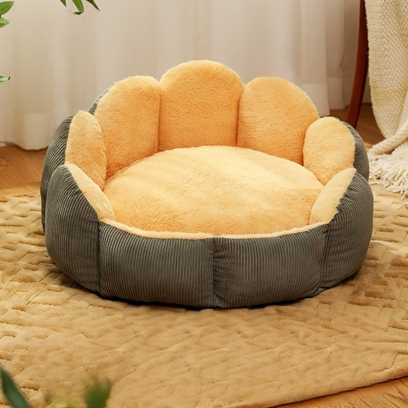 gray color queen's seat cat bed that looks like a shell shape with minimalist style