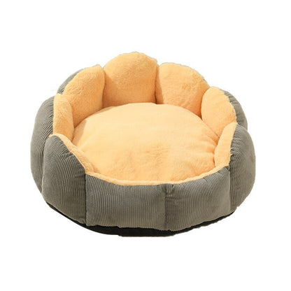 cute looking cat bed that is comfortable for pets made from warm materials
