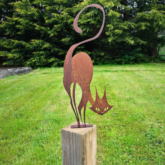 a cat garden statue made from rusty metal for outdoor decor
