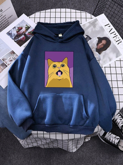 blue color hoodie with a picture of a cat looking very shocked that is inspired from a famous cat meme