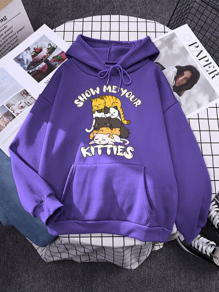 purple hoodie that has a pouch and a picture of cats tower made from five kitties