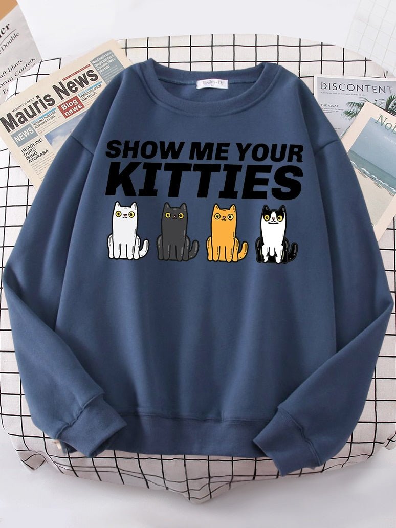 a blue sweatshirt with cat and funny puns