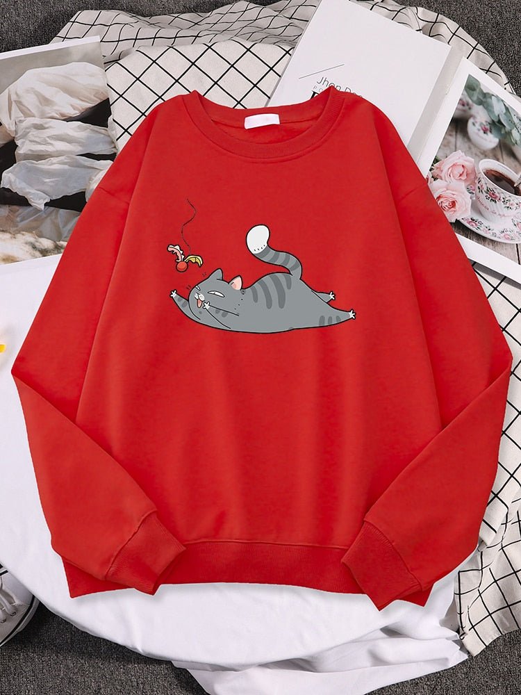 a red color sweatshirt with cat playing with shuttlecock