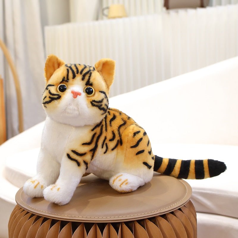 a realistic cat stuffed animal for cuddle