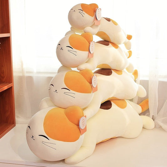 various sizes of long cat plushie of a calico cats