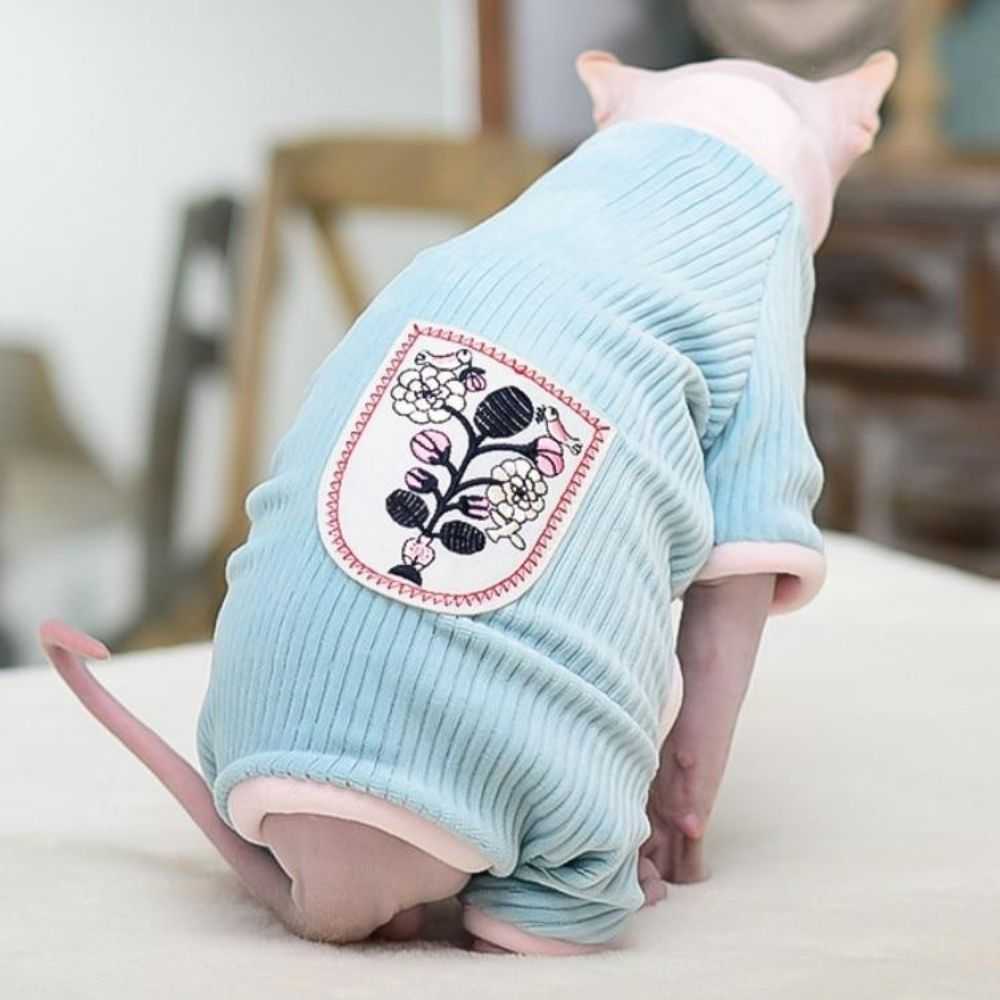 a comfy sphynx clothes for cats with flower doodles design