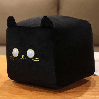 a black cat plushie in square shape