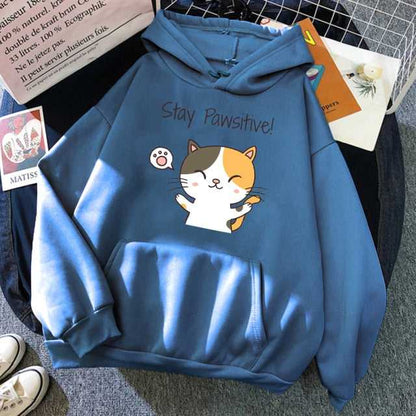 haze blue color hoodie made from cotton featuring a calico cat with motivational quotes