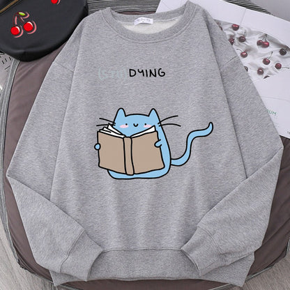 a grey color sweatshirts with cats on them studying