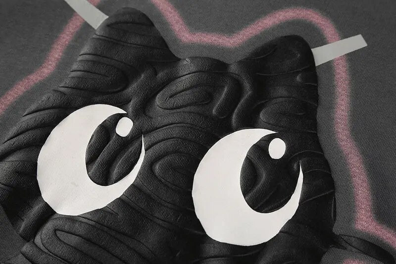 Detailed view of the Black Cat Hoodie’s unique texture