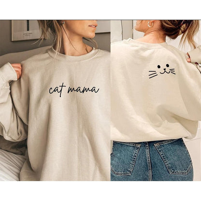 a biege color very cute cat lady sweatshirt that says cat mama