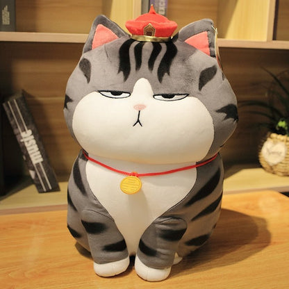 a jumbo cat plush of a cat wearing a crown