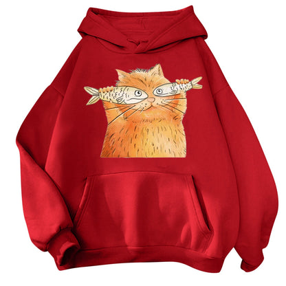 red hoodie that looks cute with an orange cat holding 2 fish as a disguised for the cats eyes