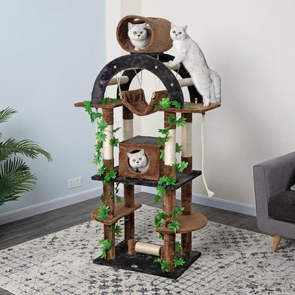 cats playing on a cat tree with hammock 