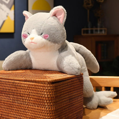 a unique cat plushie of a cat with dolphin tail