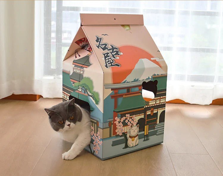 very cute looking cat house that comes with a bed with a milk carton design