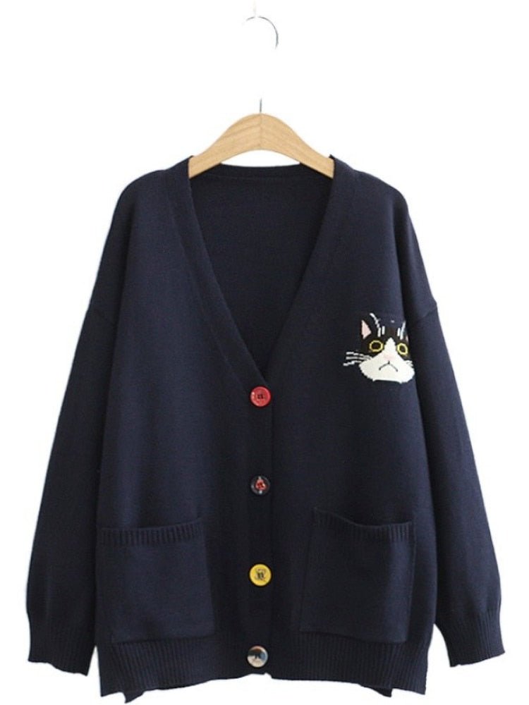 a navy blue sweatshirt with cat pouch with a cat picture