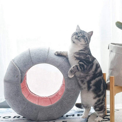 creative design shell bedding for cat that is flexible in shape and comes in grey and pink color