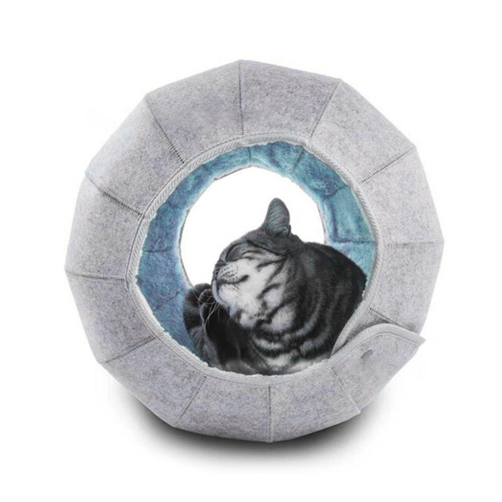 modern style cat bed in grey and blue color with a shell design 