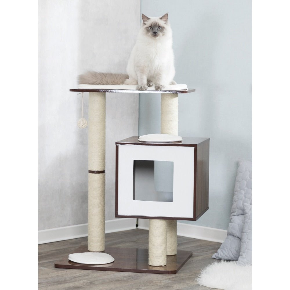 a cat sitting on a white cat tree with modern design