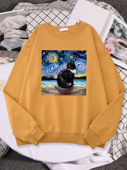 a orange color cute cat sweatshirt with picture of a cat and starry nights