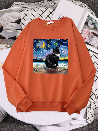 an orange color cat lover sweatshirt with picture of cat and starry night