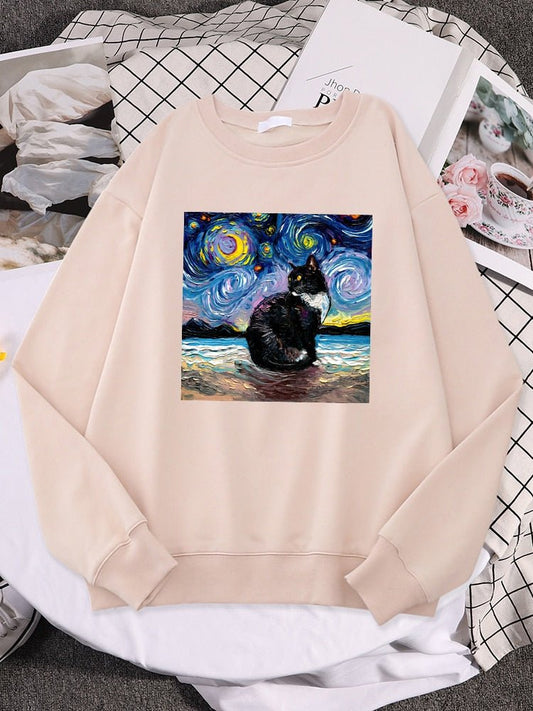 a biege color cute cat sweaters with picture of cat and starry nights