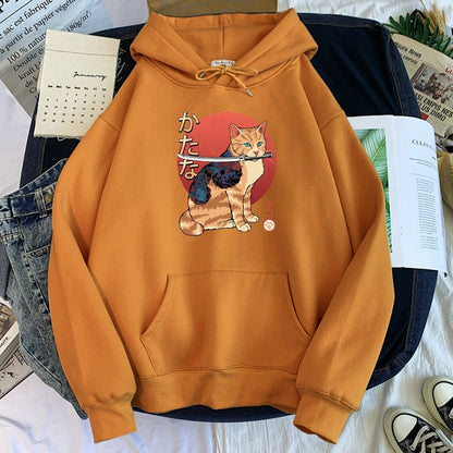 a brown color samurai sweatshirt with picture of cat holding a sword in its mouth which symbolizes bravery