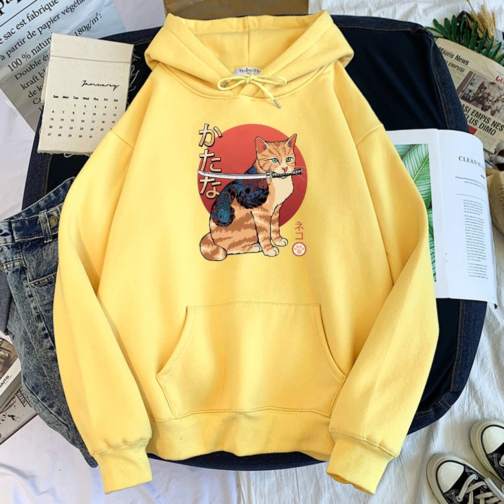 a yellow hoodie with japanese design samurai cat