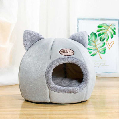 modern style cat house with enclosed space that has ears and looks cute