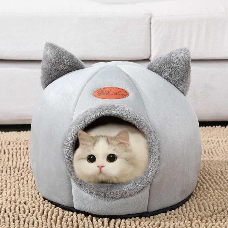 cute design cat bed in grey color with an enclosed space and has ears
