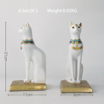 White Egyptian style cat sculpture pair for bookshelf