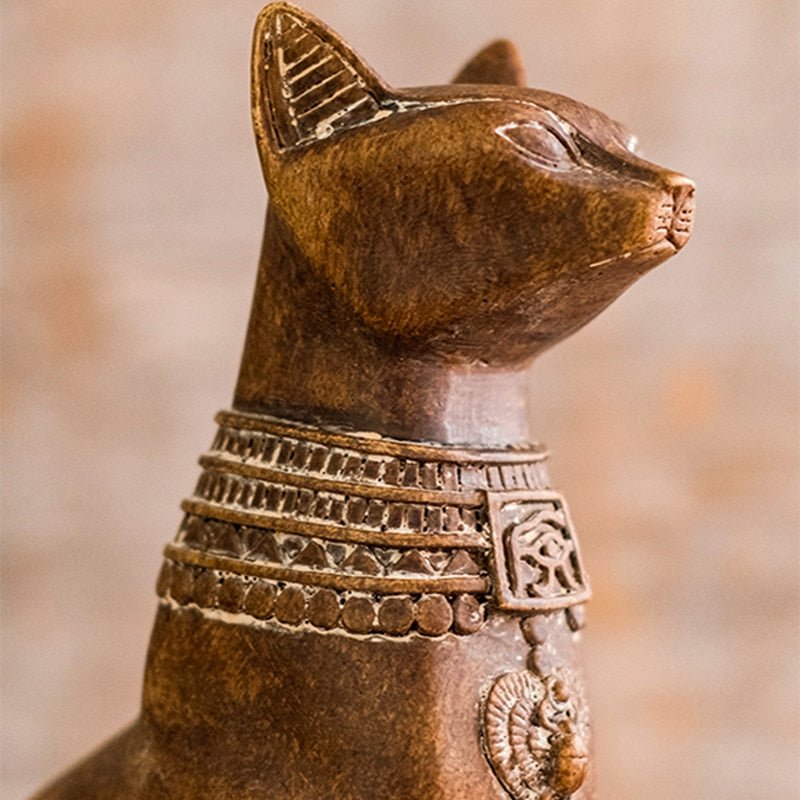 a close up of a egyptian cat statue for home decor