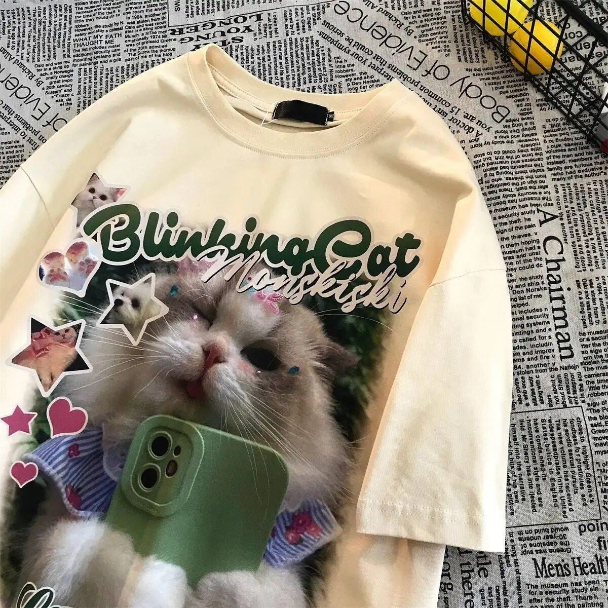 Steal the Show with Y2K Cat Graphics | Blinking Cat T-Shirt – Meowgicians™